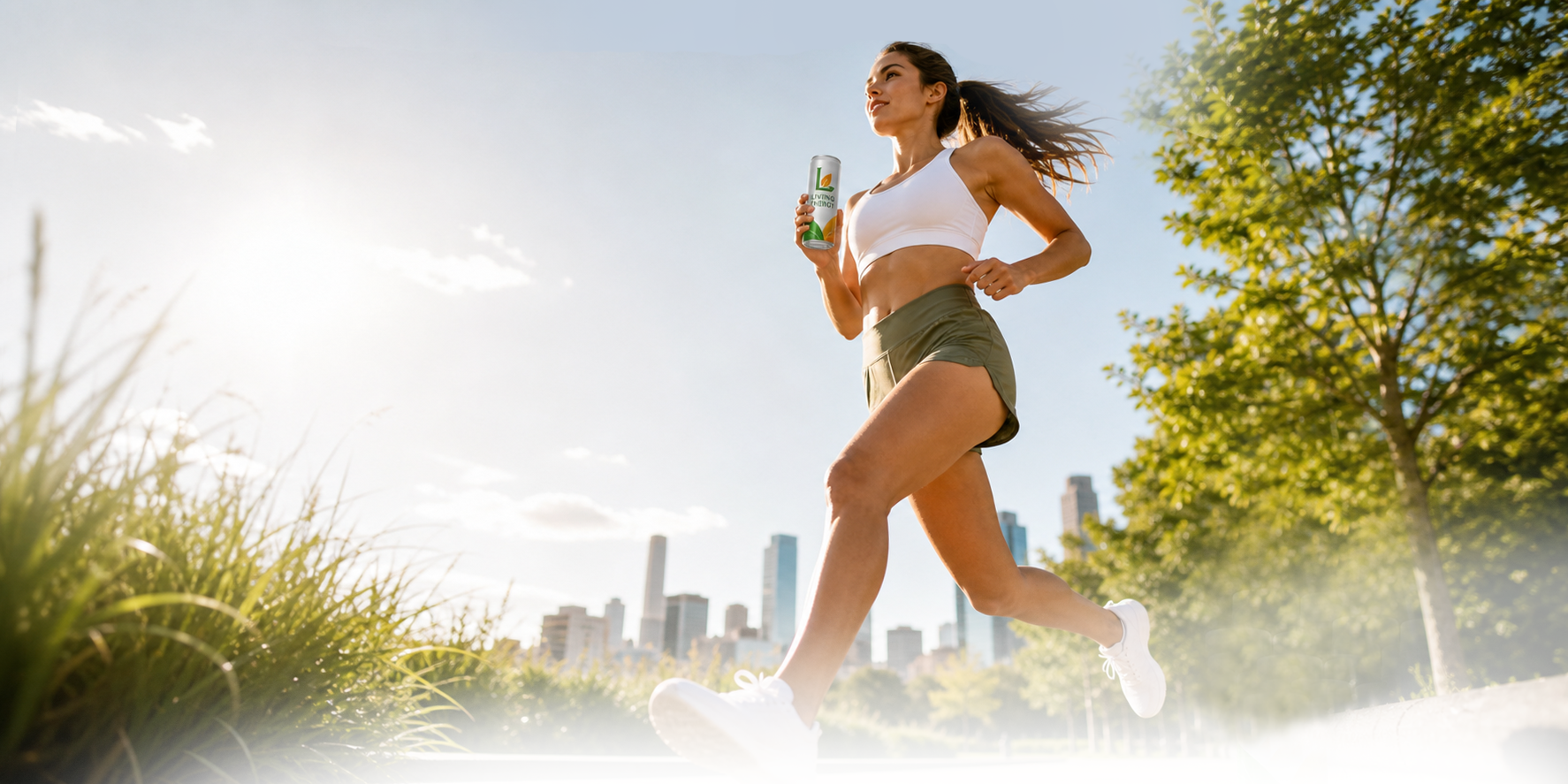 Runner photographed from a low angle with Living Energy wellness drink branding